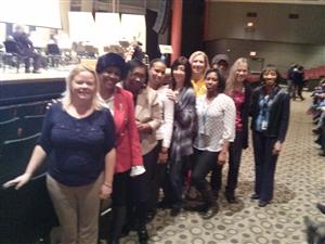 2-4 teachers pose at the show 